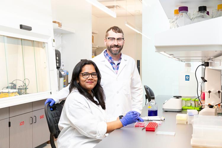 professor tristan driscoll and female grad student in his lab at famu-fsu engineering