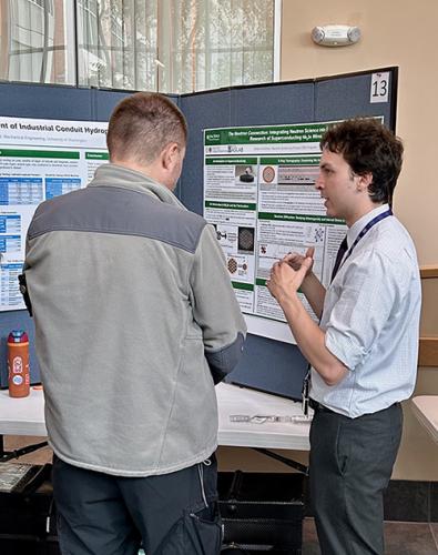aj hoolihan famu-fsu engineering grad student talks about his poster