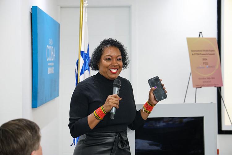 photo of woman taking in mic