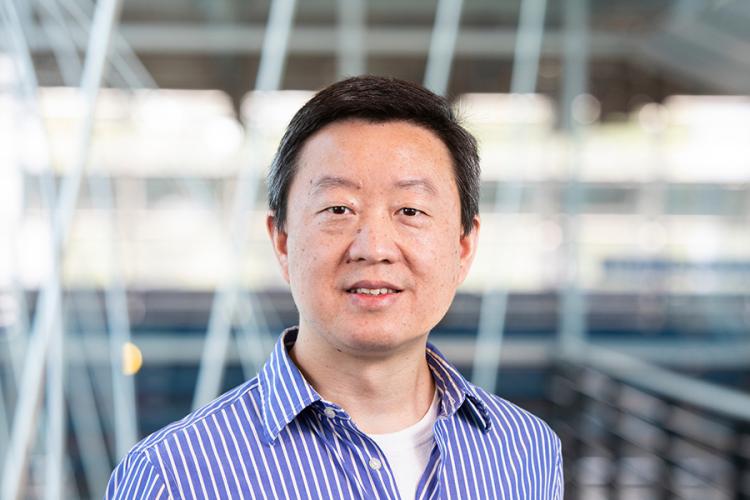 headshot of engineering professor wei guo