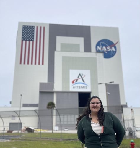 gabrielle mayans in front of vehicle assembly building at kennedy space center