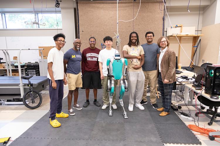 group photo of engineering students in lab with digit robot at famu-fsu engineering