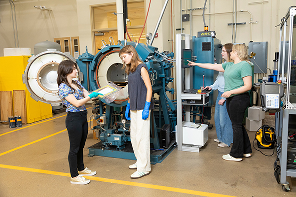 photo of famu-fsu engineering female grad students with two high school female engineering interns in the lab