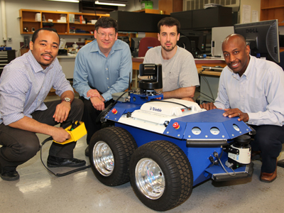 Dr. Moore and Dr. Roberts with engineering students