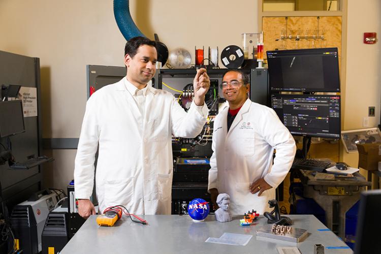 famu-fsu engineering professors jamel ali and rama in the lab