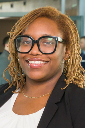 photo of woman in glasses and suit