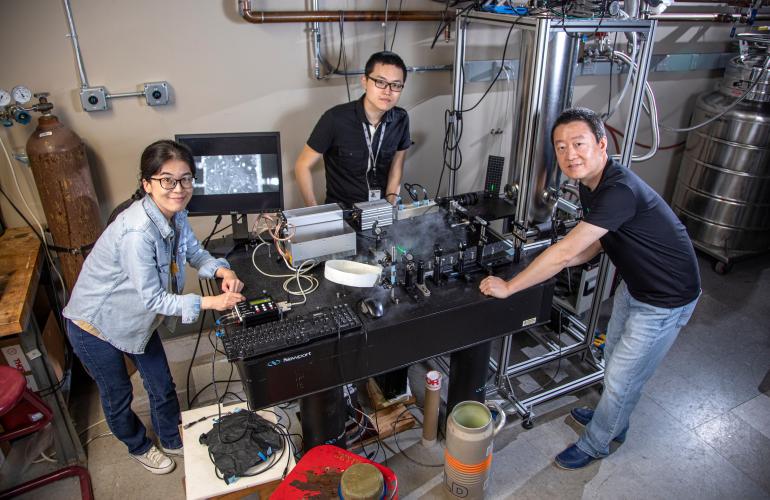 Wei Guo and students in his lab at the National High Magnetic Field Laboratory