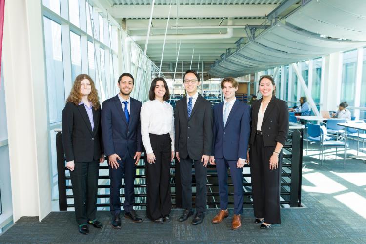 The six members of engineering senior design team 106 stand together on the third floor breezeway at the FAMU-FSU College of Engineering.