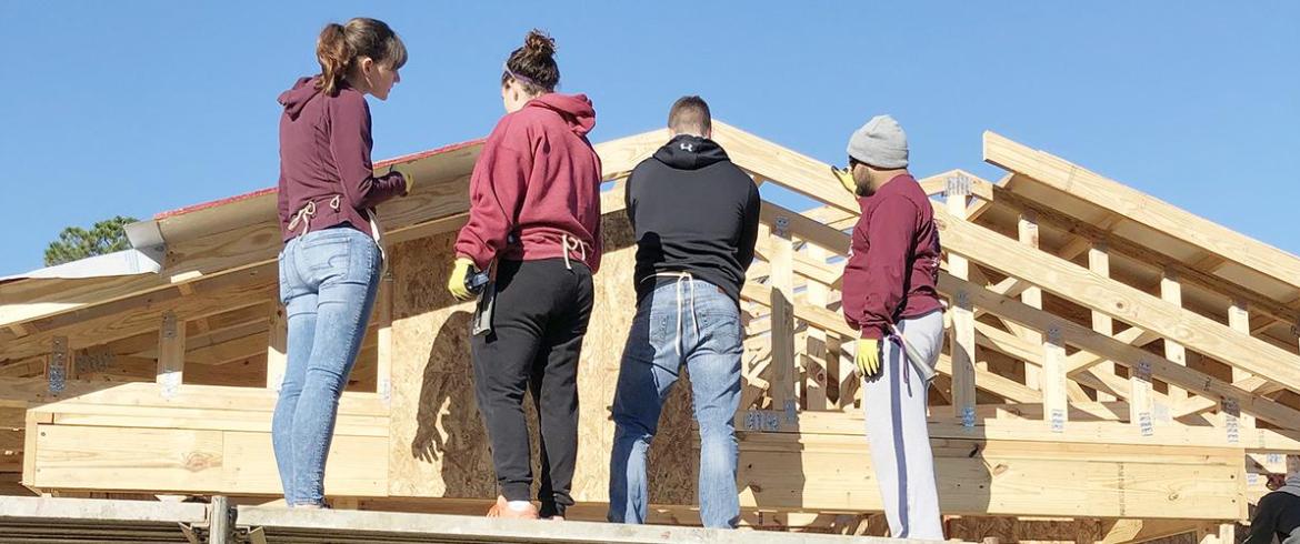 Civil engineering students working on Habitat House