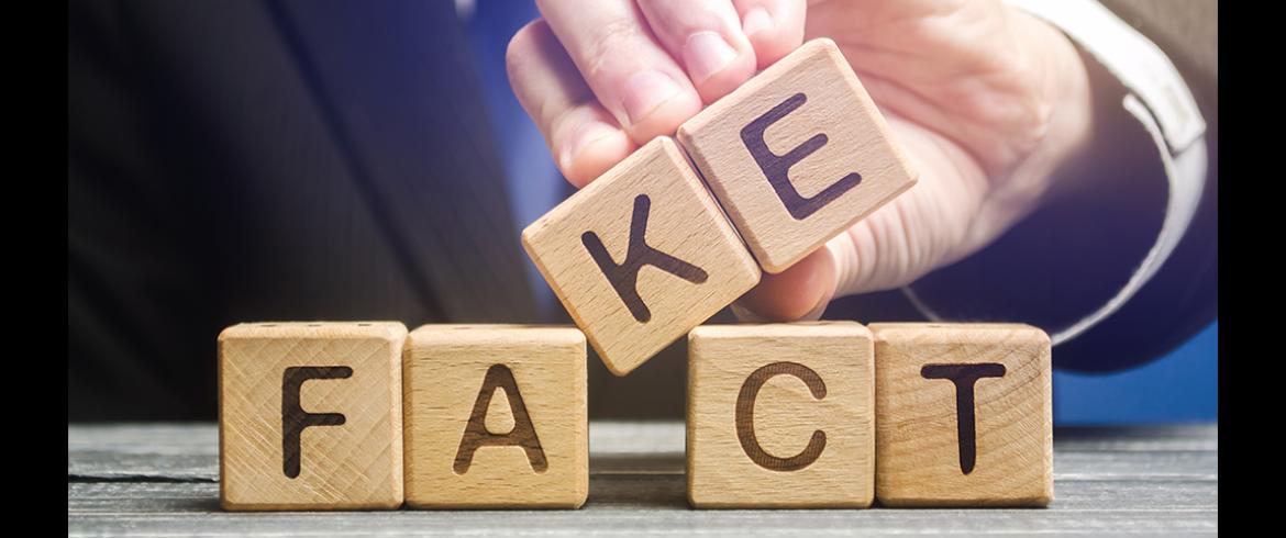 photo of blocks spelling fake and fact