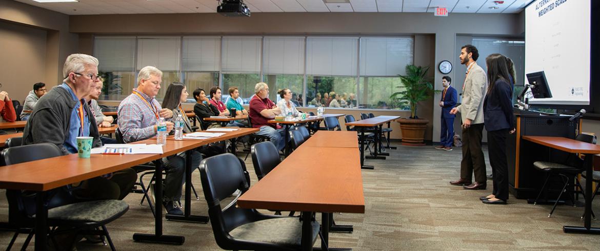photo of senior design team presenting in classrroom