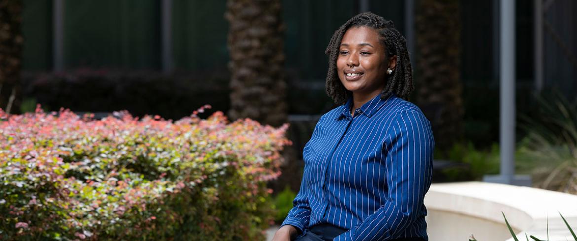 portrait of doctoral student franchesca bellevu in front of the famu-fsu college of engineering