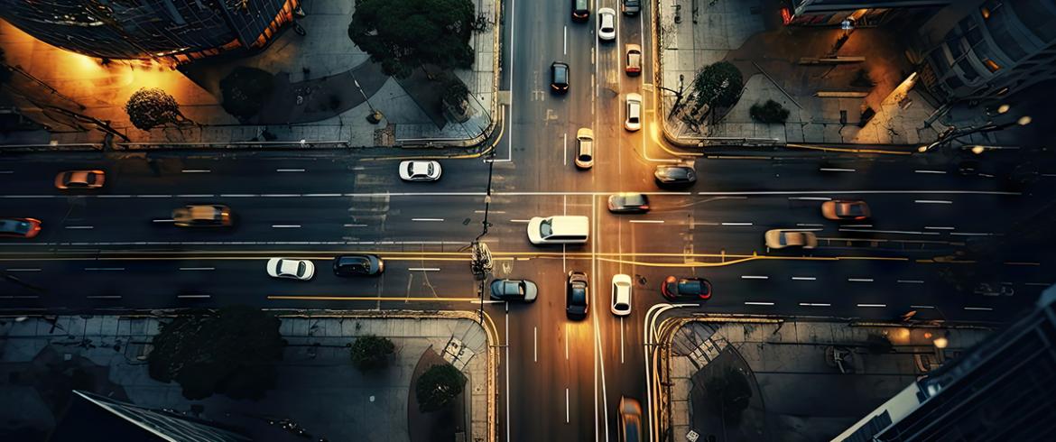 top view of intersection in a prosperous city, time lapse of car, long shutter speed