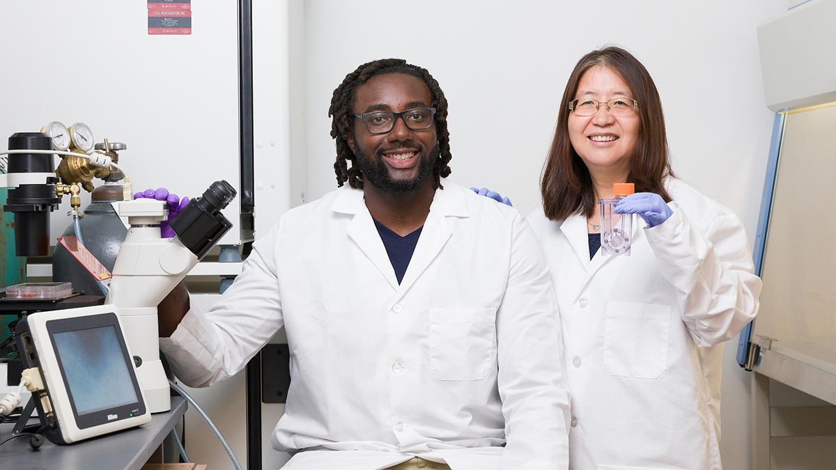 photo of justice ene and yan li in the famu-fsu engineering lab
