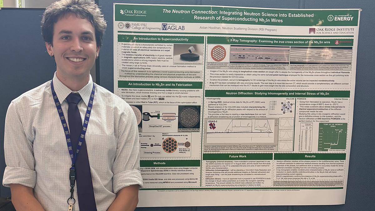 photo of aj hoolihan famu-fsu engineering student with his ornl poster