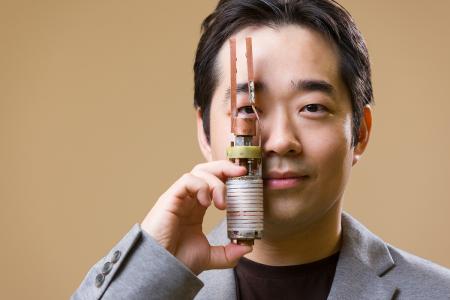 photo of famu-fsu engineering faculty jeseok bang with little big coil
