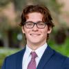 headshot of undergrad engineering student with red hair and glasses as florida state university 