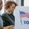 photo of women using voting booths